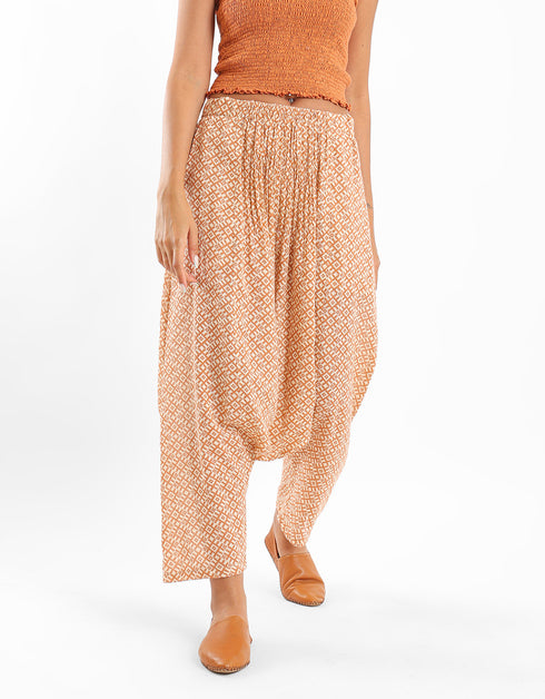 Printed harem pants with pleats on the front and back